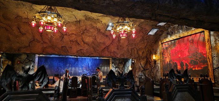 Carved bat gargoyles perched over the booths in the torchlit stone dining room.