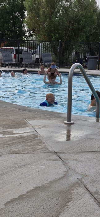 Cooling off in the resort pool after a hot day in the Hills.