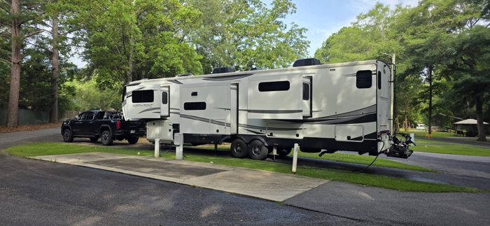 A wider look at our fifth-wheel parked at the campground before pulling out this morning.