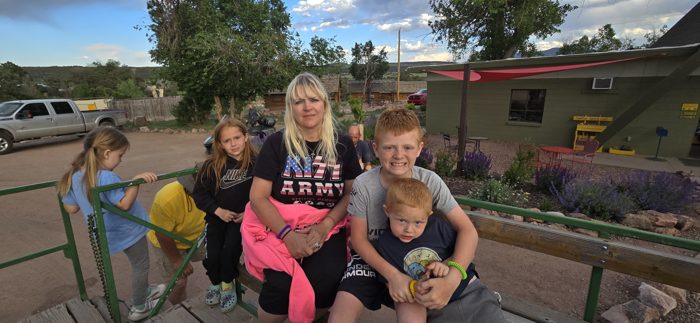 The kids gathered together for a sweet group photo at the park.