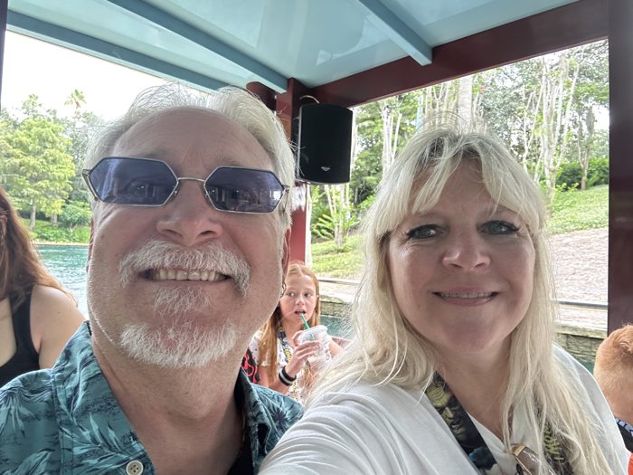 A selfie on the water taxi with the kids close behind, gliding through the Universal Orlando canals.