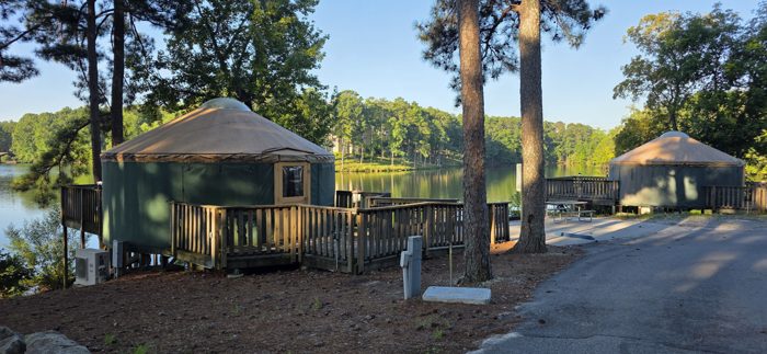 Our row of lakeside yurts catching the first light of the morning.