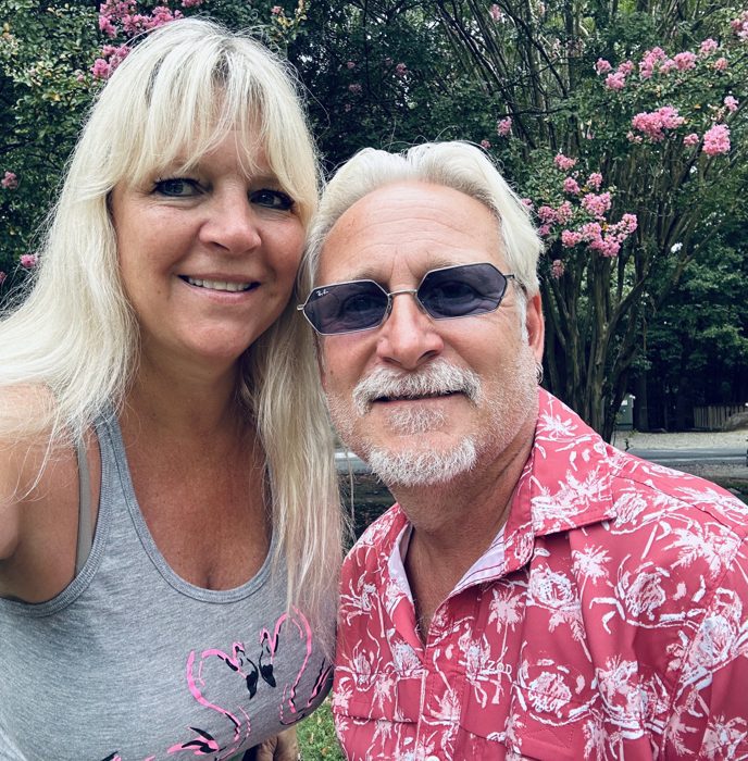 A close selfie together under the crepe myrtles, matching pink for the occasion.