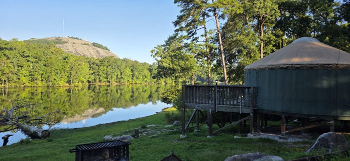 Stone Mountain's granite dome rises across the lake from our yurt for the night.