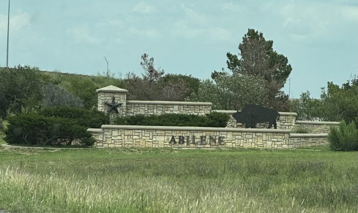 Passing the stone Abilene welcome sign on the way west.