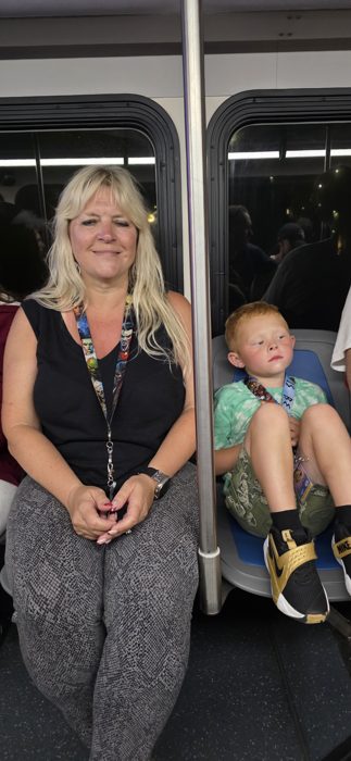 A quieter moment on the monorail as the tired crew heads back after dark.