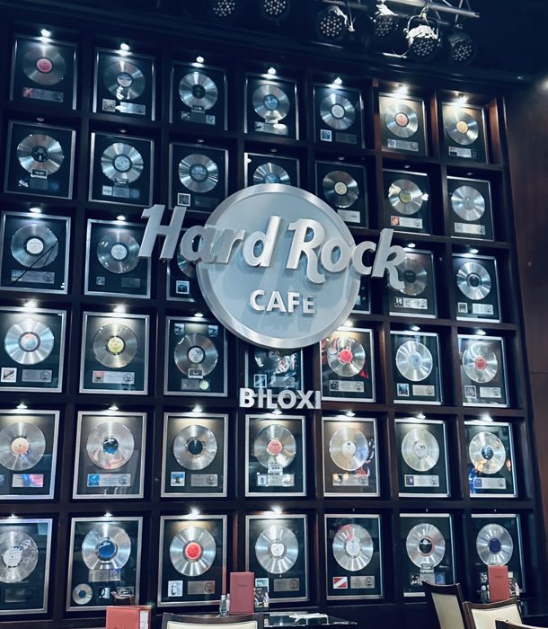 A wall of signed KISS gold records on display inside the Hard Rock.