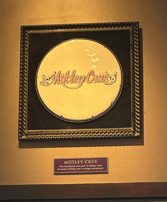 A framed Motley Crue gold record on display at the Hard Rock.