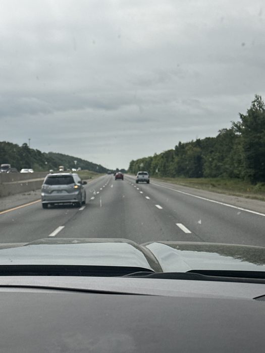 Steady rain on the highway as we roll toward the next stop.