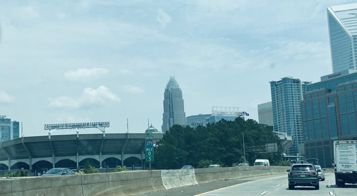 The Charlotte skyline rising above the trees on our way to the coast.