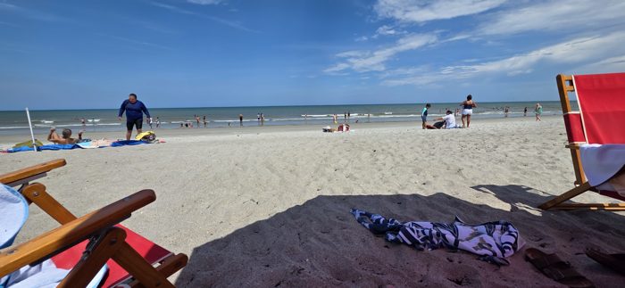 Beach chairs and towels mark our spot for an afternoon watching the tide roll in.