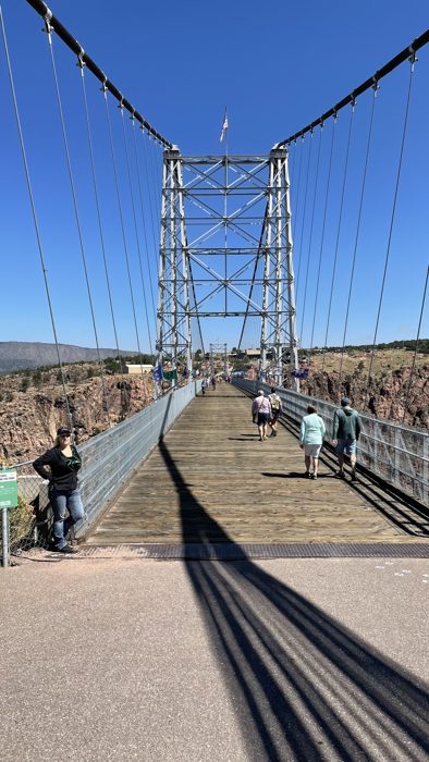 Walking the wooden plank deck of the Royal Gorge Bridge.