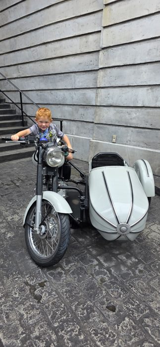 One more pose on the sidecar motorcycle before we move along to the next shop.