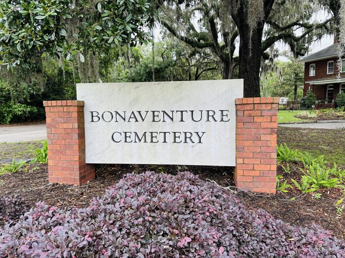 The Bonaventure Cemetery entrance sign welcomes visitors under the oaks.