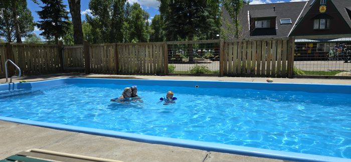 Cooling off with a swim in the campground pool on a bluebird Steamboat day.