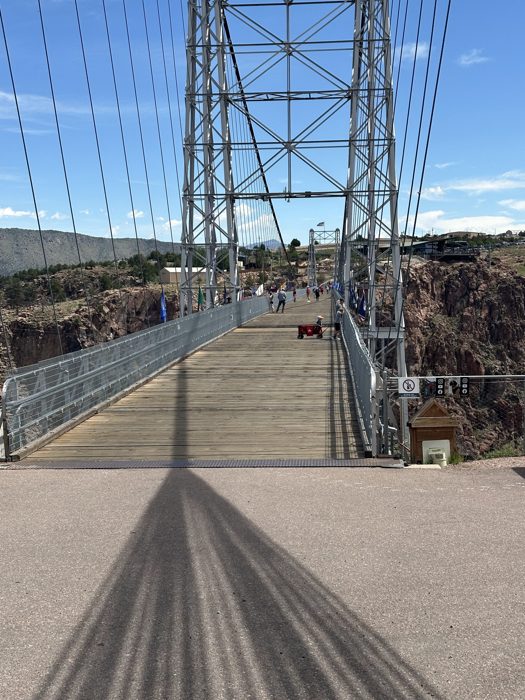 The weathered ROYAL GORGE BRIDGE EST. plank marking our crossing.