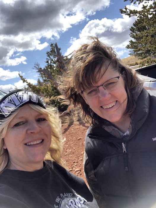 Krisstine and a friend soaking up the Laramie sunshine.