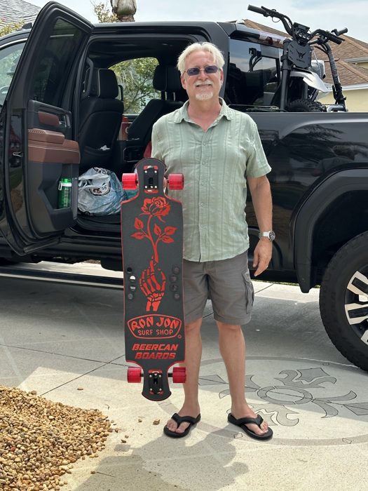 Showing off a new Ron Jon longboard picked up on the Florida leg of the trip.