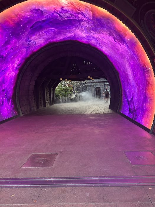 Walking through the swirling purple energy tunnel leading into the Frankenstein ride.