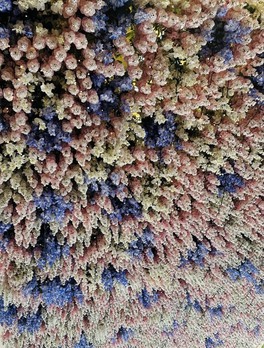 A dazzling close-up of bluebonnet-blue mosaic tiles along the River Walk.