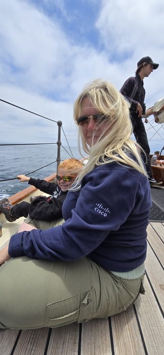 Relaxing aboard a classic sailboat out on the bay.