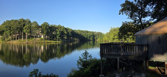 Morning light on the lake from our yurt's deck, the whole campground still quiet.