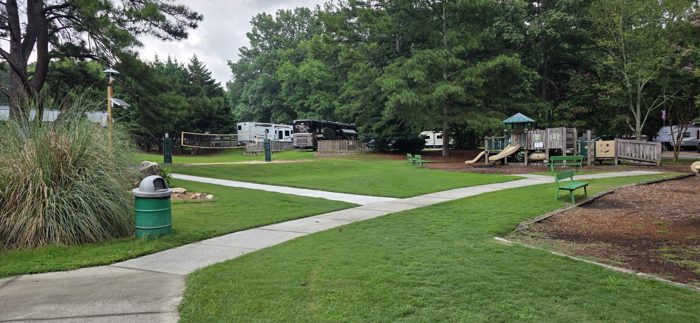 The playground and RV rows sit quiet in the early morning hush at the campground.
