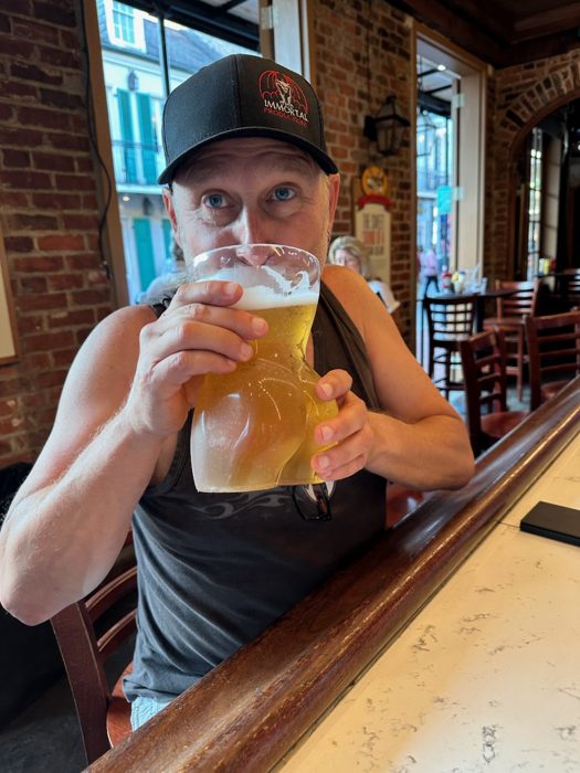 Cheers from the bar with a cold draft in hand.
