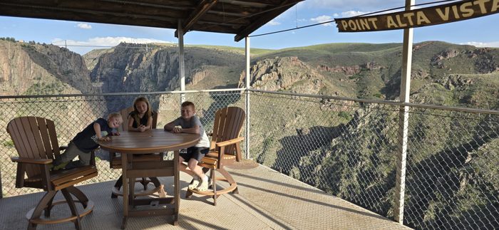 Taking a breather at the shaded Point Alta Vista overlook with the gorge dropping away below.