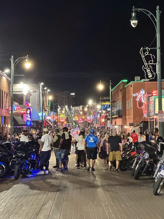 Beale Street roars with motorcycles and crowds on a bustling bike night.
