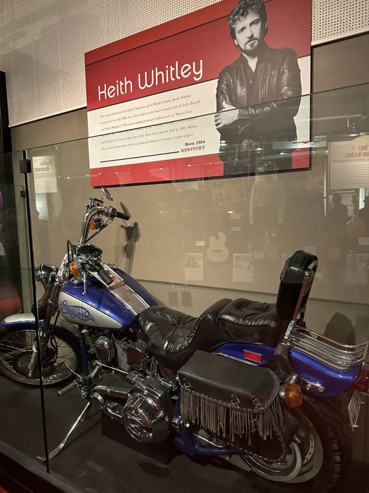 A classic motorcycle on display inside the Country Music Hall of Fame.