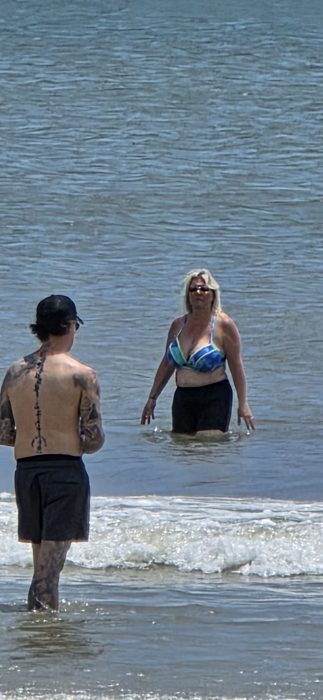 Taking a break from the boards to enjoy the water together.