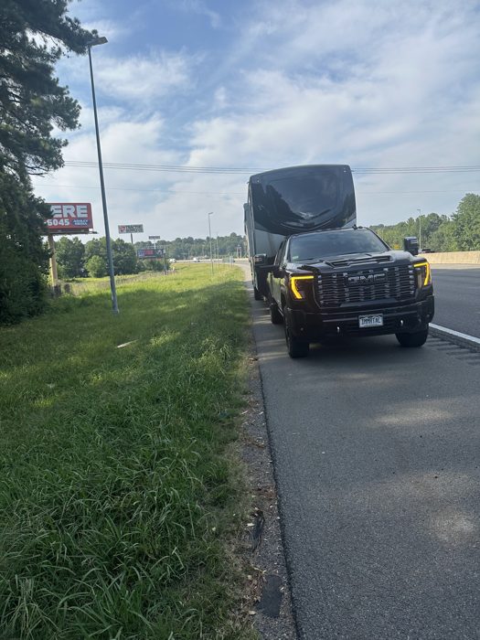 Pulled over on the shoulder with hazards flashing after trouble crops up on the interstate.