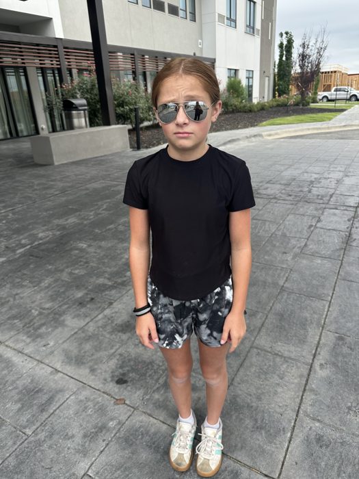 One of the kids strikes a serious pose in her aviators before we check out.