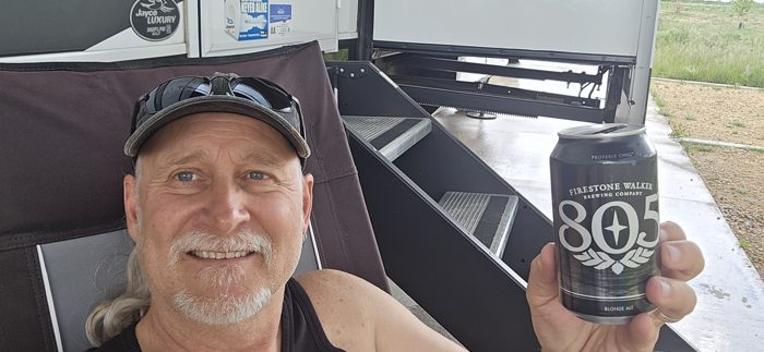 Dad kicks back lakeside with a cold 805 in hand.