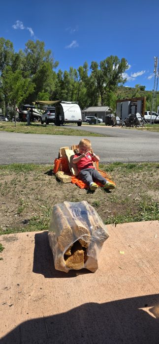 Sunny afternoon at the campsite with the RV park spread out behind.