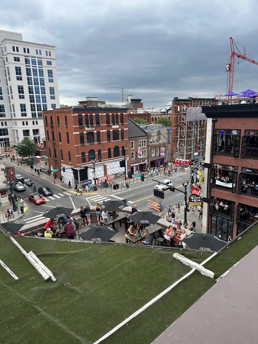 A bird's-eye view down on the busy streets and rooftops of downtown Nashville.
