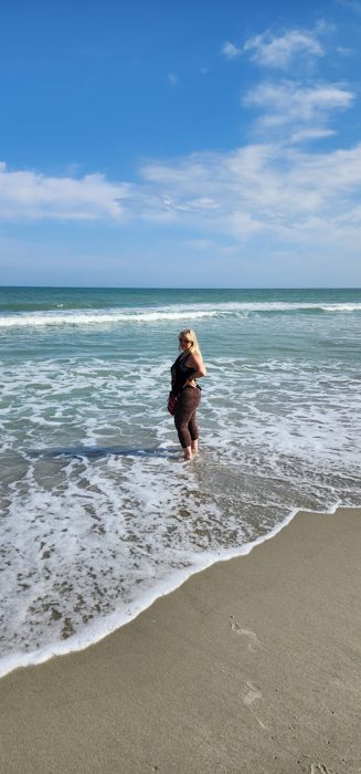 Toes in the surf along the quiet morning sand at Myrtle Beach.
